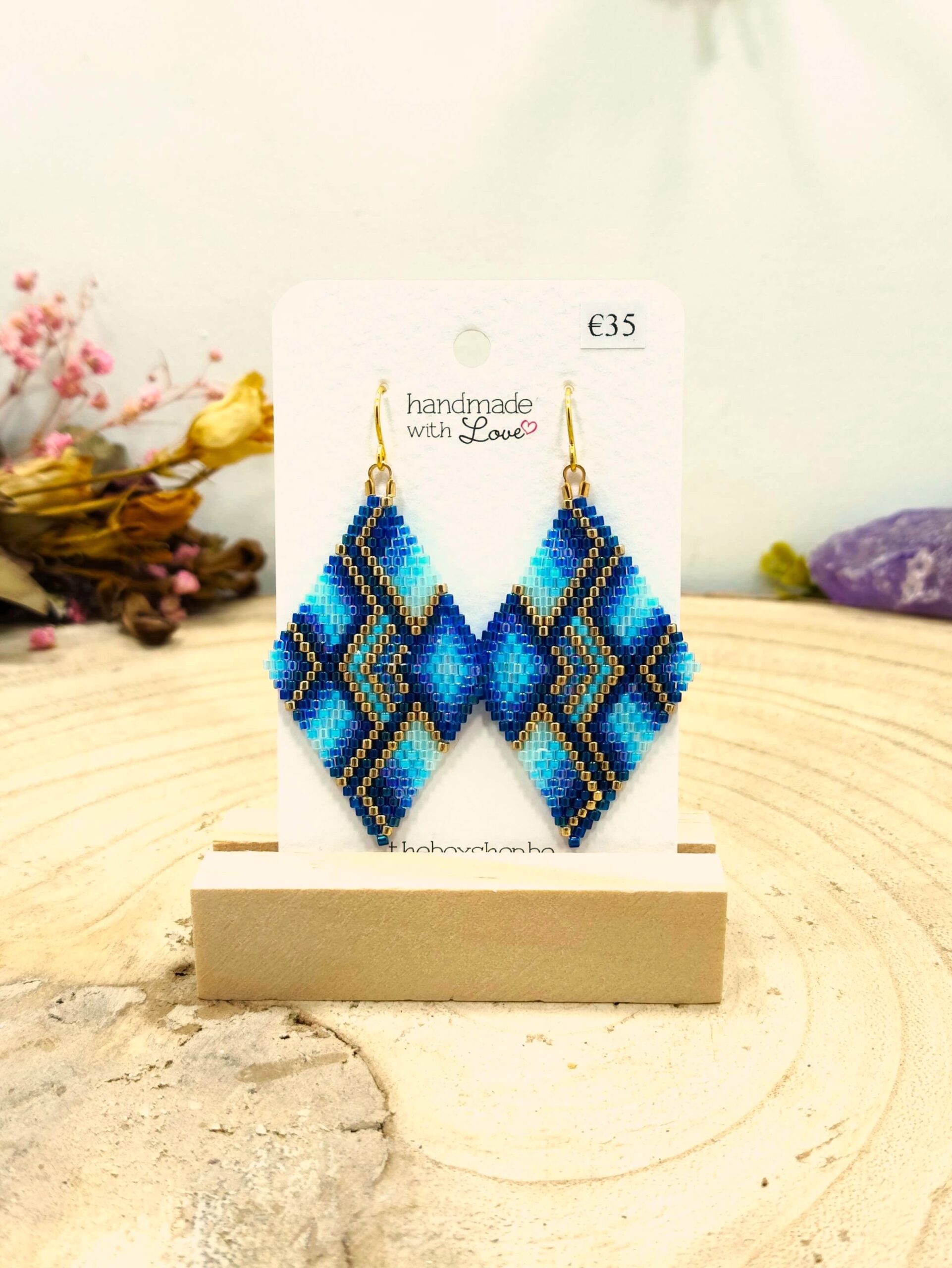Ruitvormige oorhangers in blauwe tinten