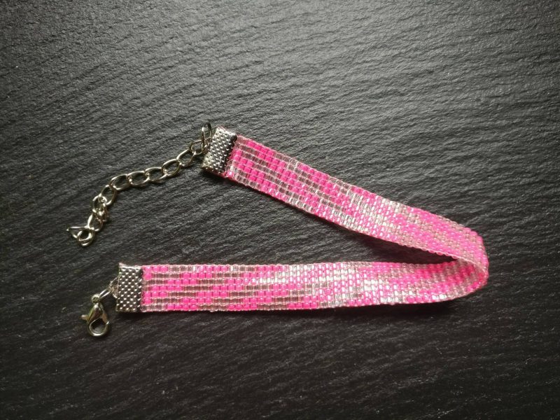 Kralenarmband in roze en doorzichtige kralen