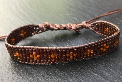 Schuifarmband bruin en koper