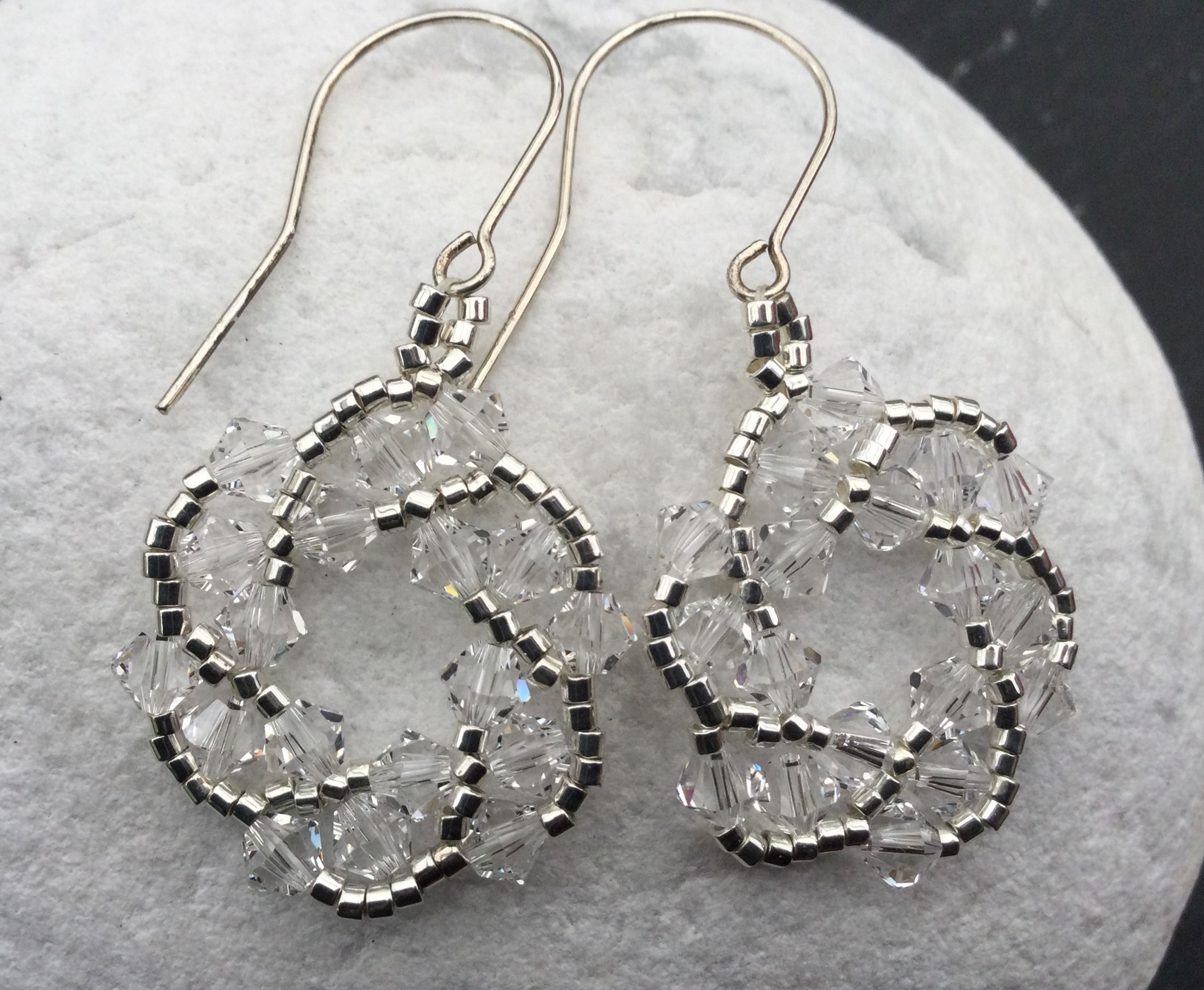 Spiraalvormige oorhangers met Swarovski kristal